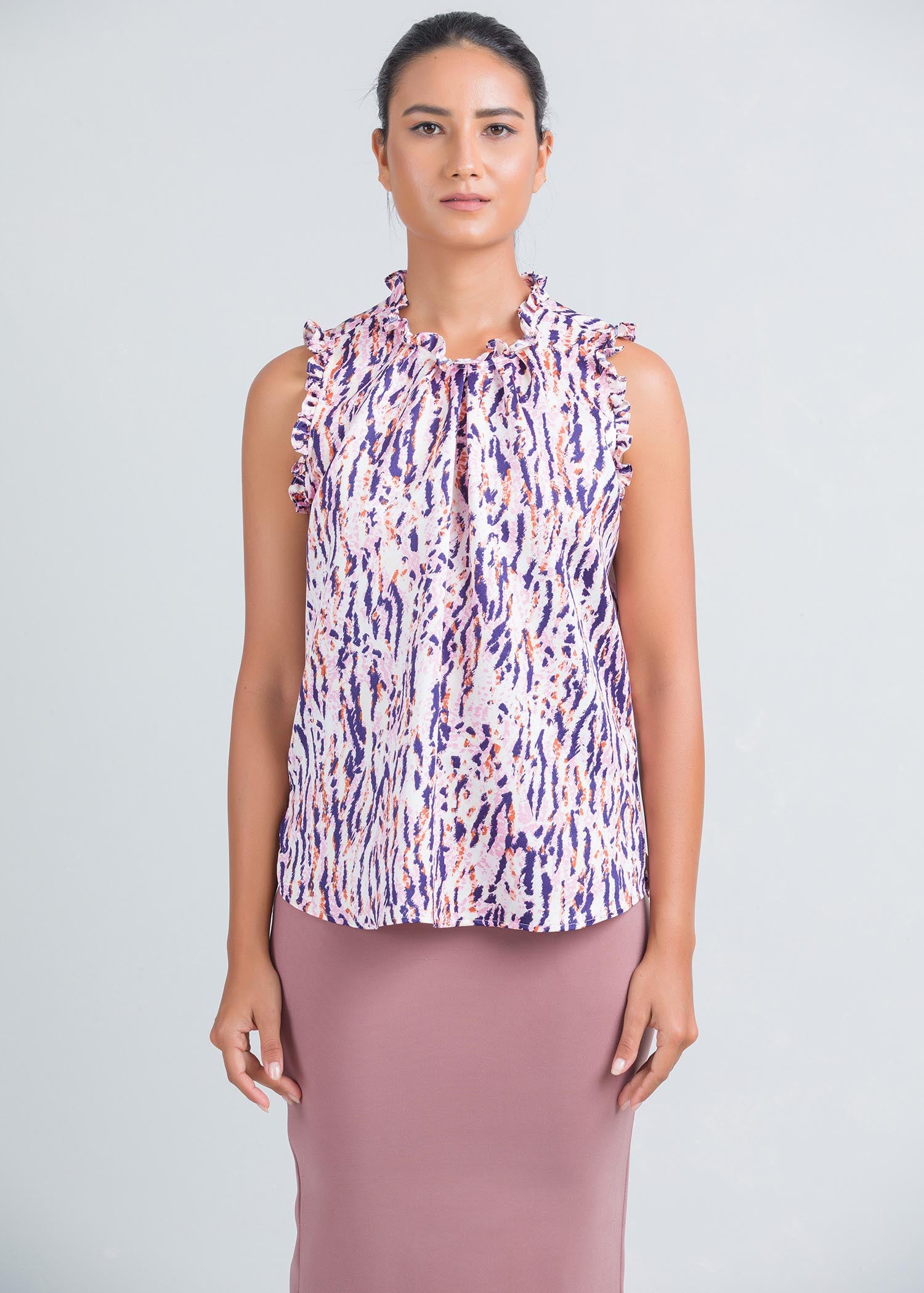 Sleeveless blouse with frill and pleat detailing
