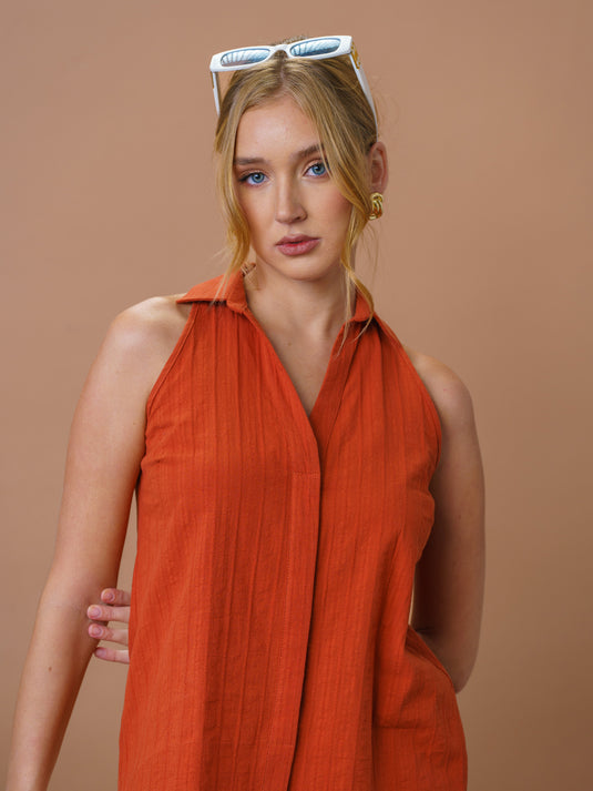 Sleeveless top with tie-ups