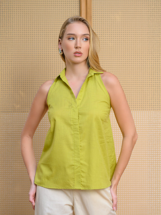 Sleeveless button sown blouse