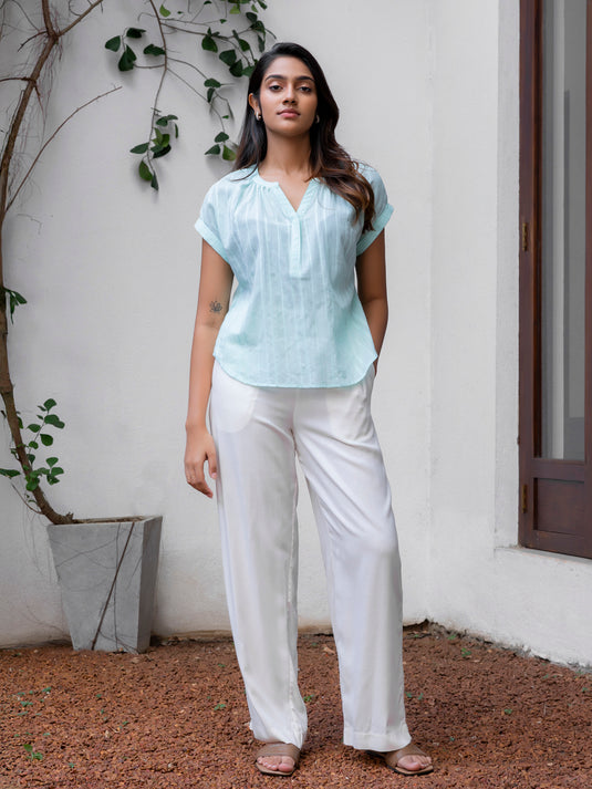 Blouse with elasticated back