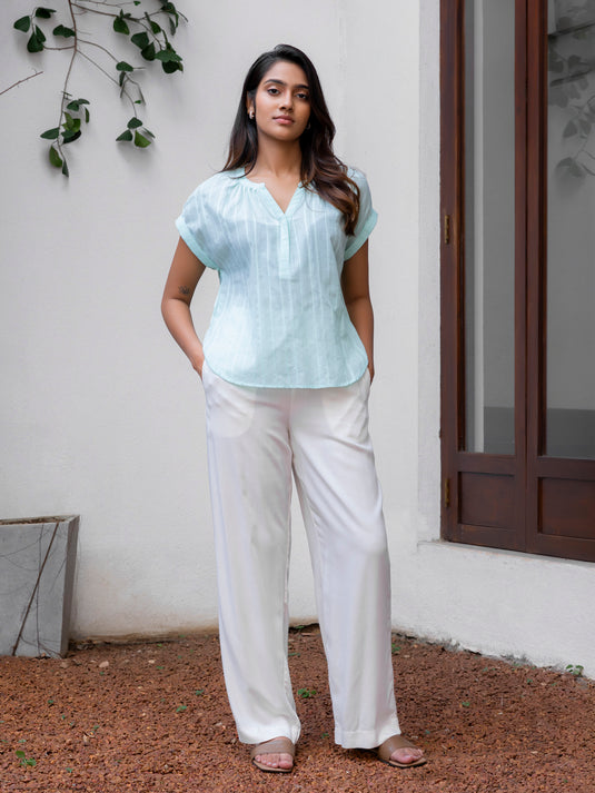 Blouse with elasticated back