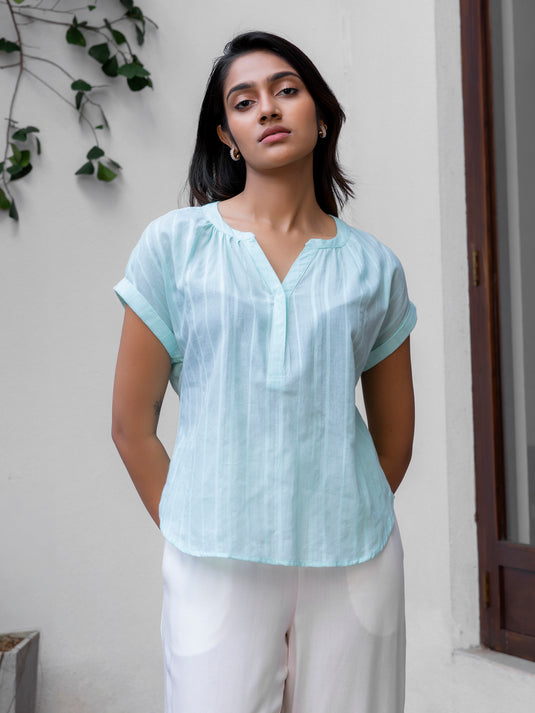 Blouse with elasticated back