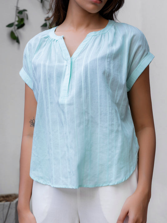 Blouse with elasticated back