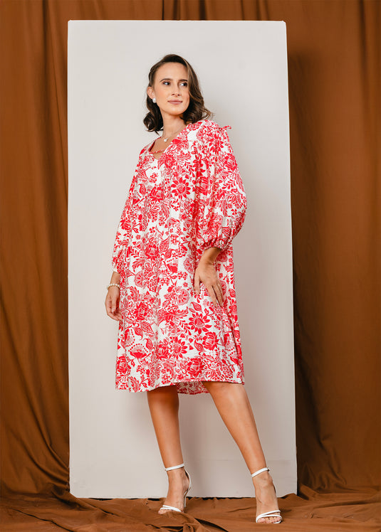 Printed V neck dress with draw cord detailing