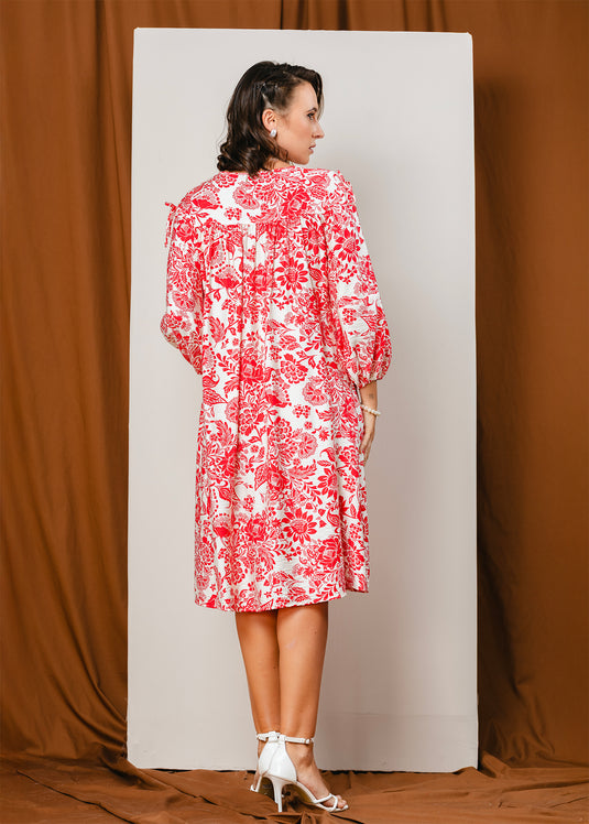 Printed V neck dress with draw cord detailing