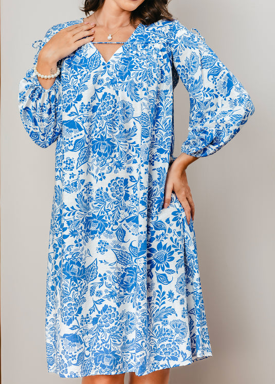 Printed V neck dress with draw cord detailing