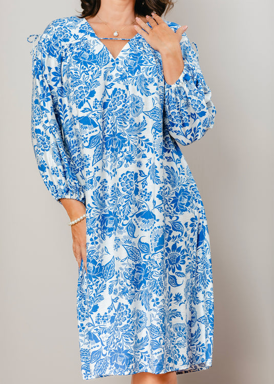 Printed V neck dress with draw cord detailing