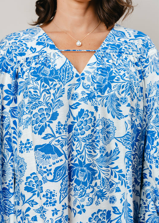 Printed V neck dress with draw cord detailing