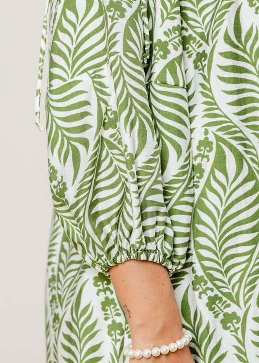 Printed V neck dress with draw cord detailing