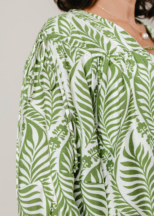 Printed V neck dress with draw cord detailing