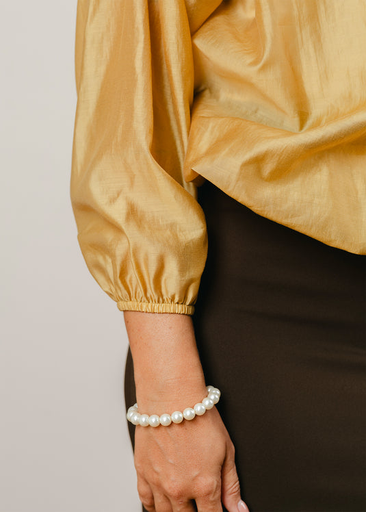 Elasticated hem blouse with front functional tie