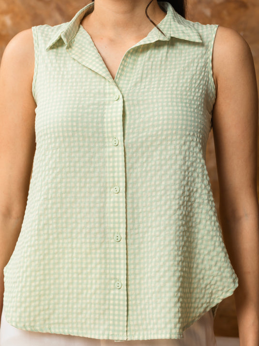 Sleeveless button down blouse