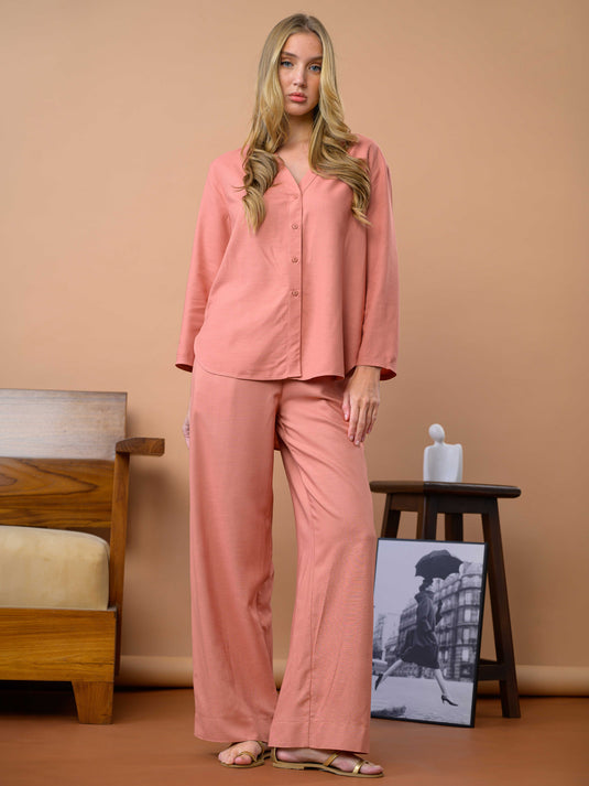 Oversized linen blouse with button detail