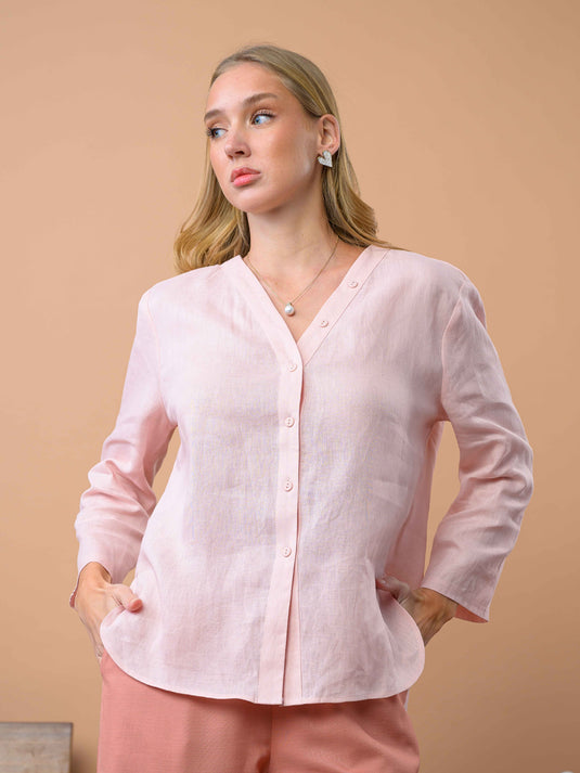 Oversized linen blouse with button detail