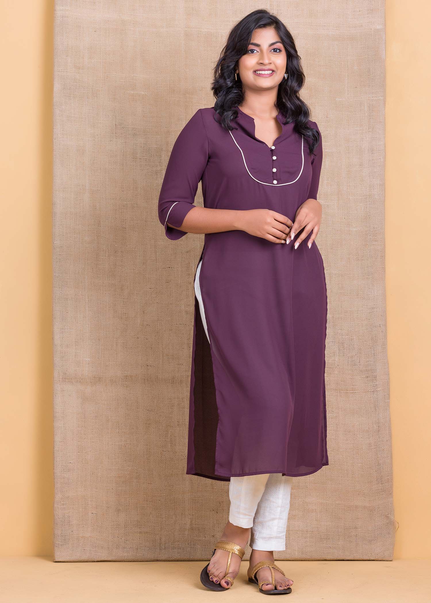Kurtha top with contrast piping and button detail