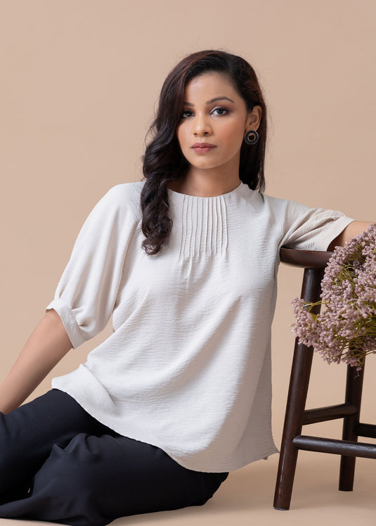 Raglan sleeve blouse with front pintucks