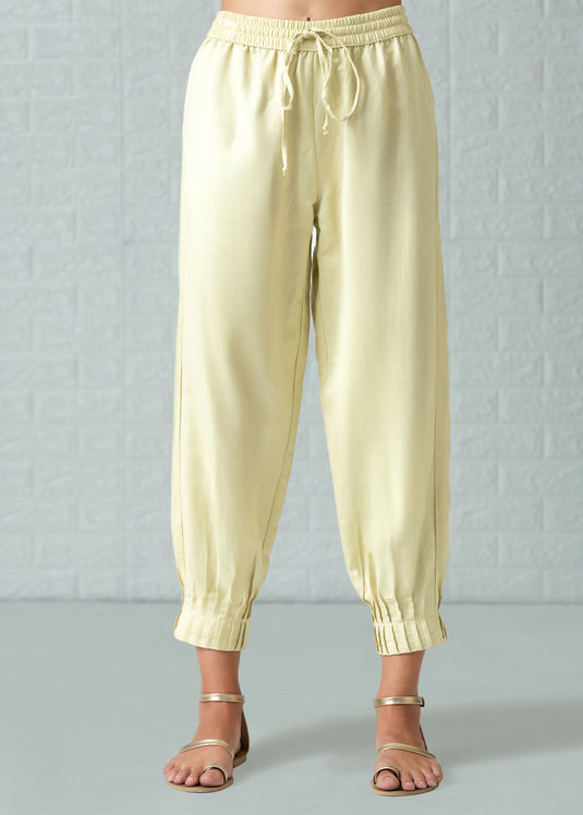 Drawcord pant with bottom pin tucks
