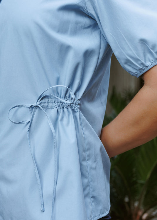 Puff sleeve button down blouse with side draw cord