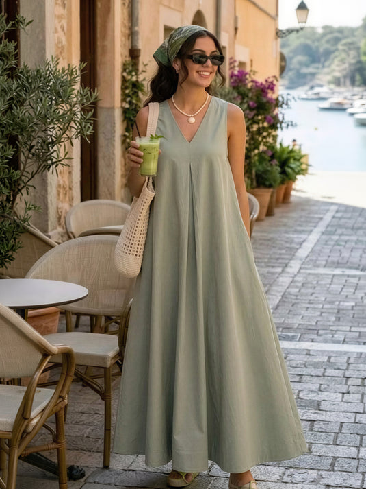 Sleeveless V neck maxi dress with front pleat