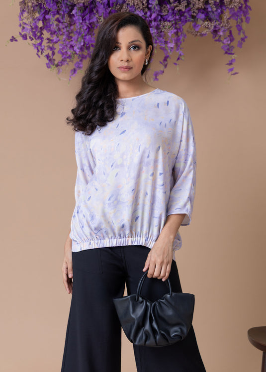 Printed dolman sleeve blouse