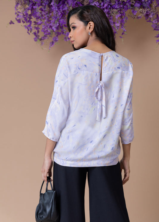 Printed dolman sleeve blouse