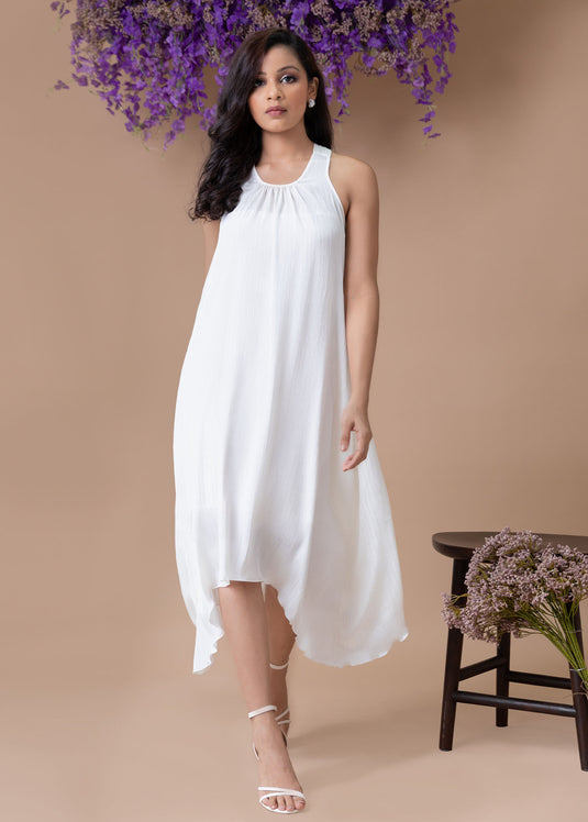 Halter dress with asymmetrical hem