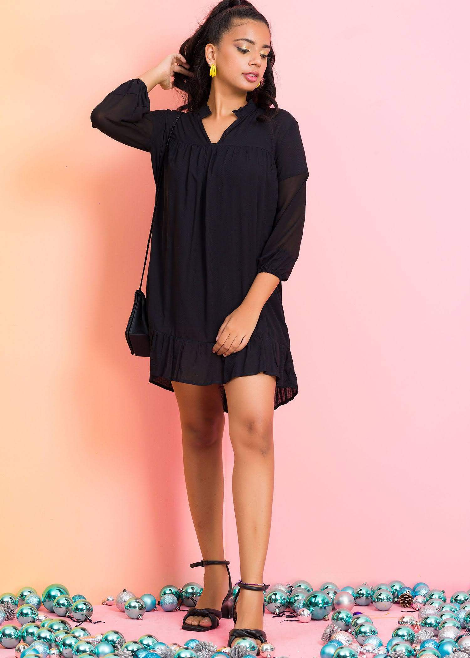 Mini dress with long sheer sleeve