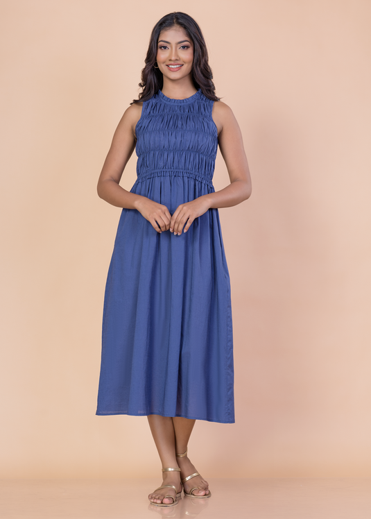 Sleeveless dress with smocking top panel