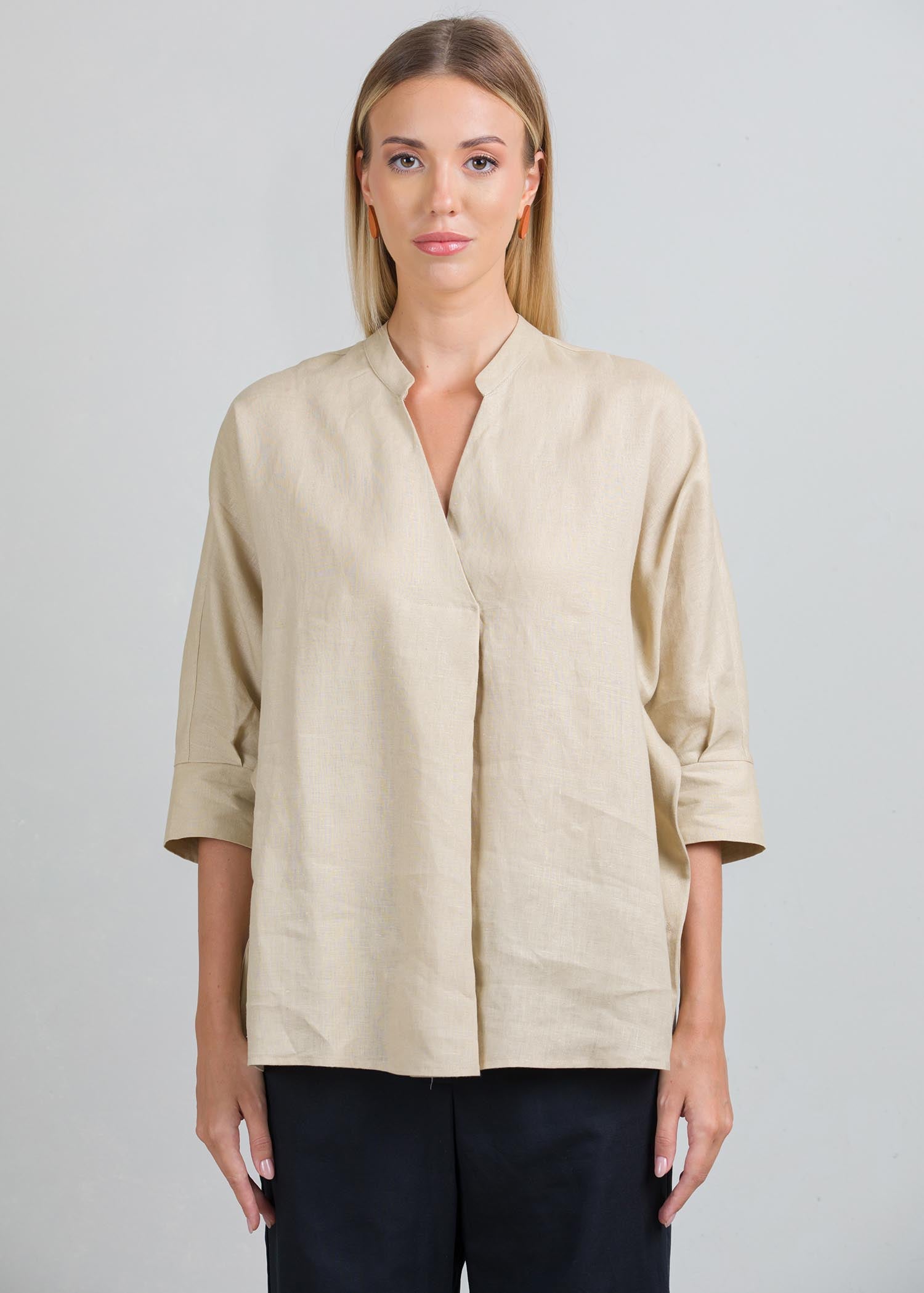 Oversized blouse with front pleat