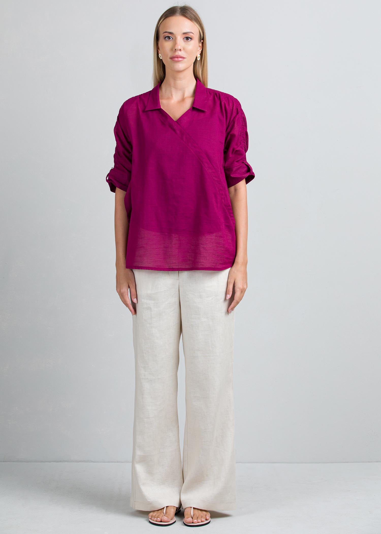 Crossover blouse with ruched sleeves