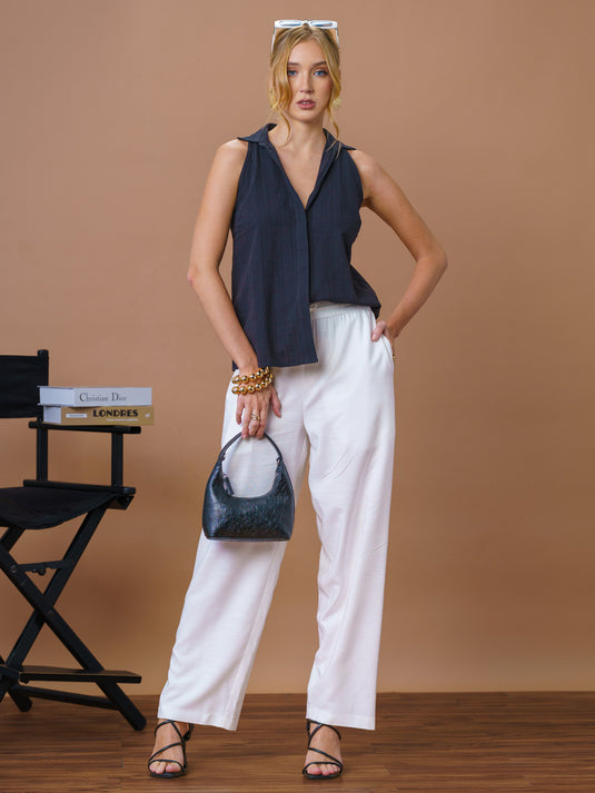 Sleeveless top with tie-ups