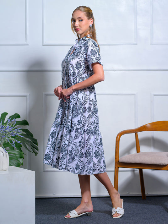 Printed tired dress with short placket