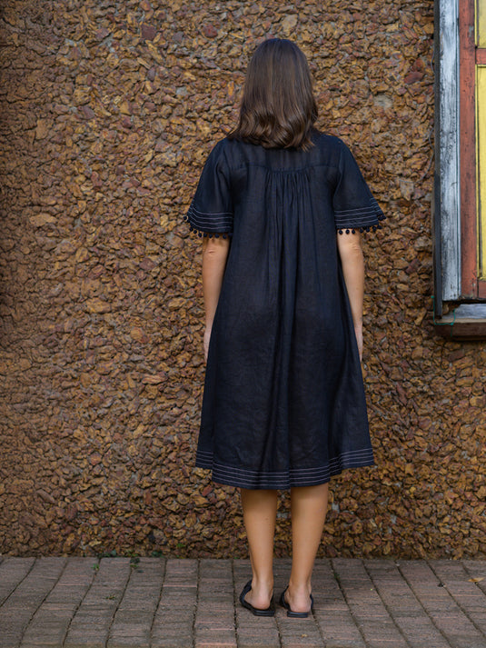 Contrast stitch detailed premium linen dress with pom pom lace