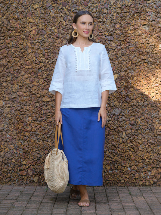 Round neck blouse with pom pom lace detail