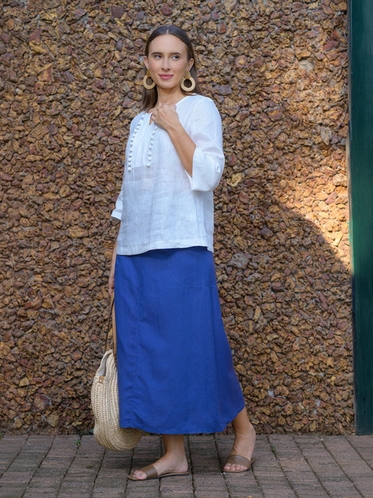 Round neck blouse with pom pom lace detail