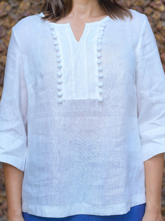 Round neck blouse with pom pom lace detail