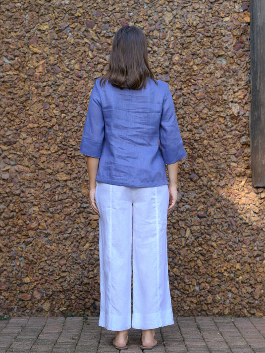 Round neck blouse with pom pom lace detail