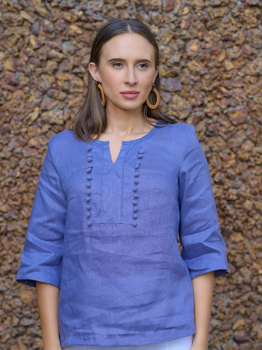 Round neck blouse with pom pom lace detail