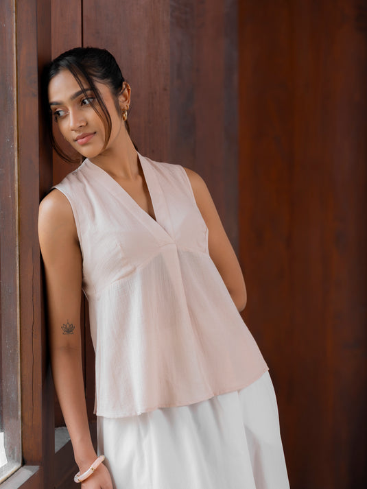 Sleeveless top with bustier panel