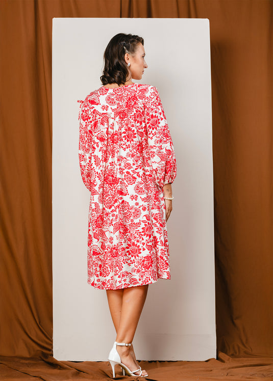 Printed V neck dress with draw cord detailing