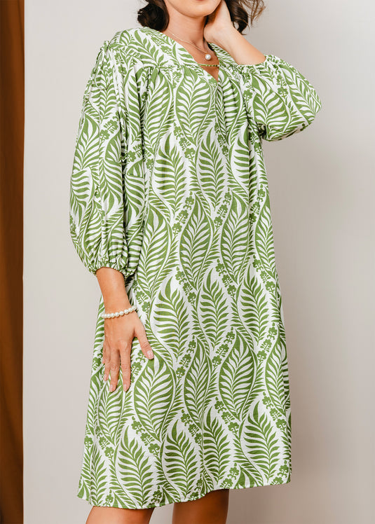 Printed V neck dress with draw cord detailing