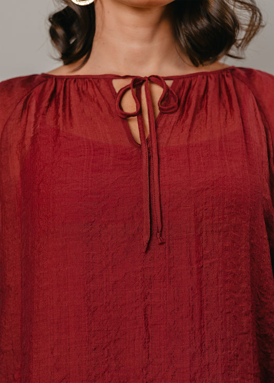 Bell sleeve blouse with front tie