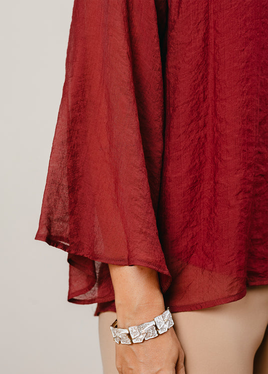 Bell sleeve blouse with front tie