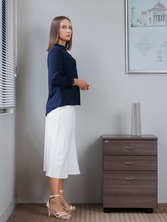 Blouse with smocked cuff