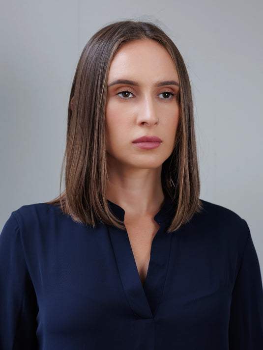 Blouse with smocked cuff