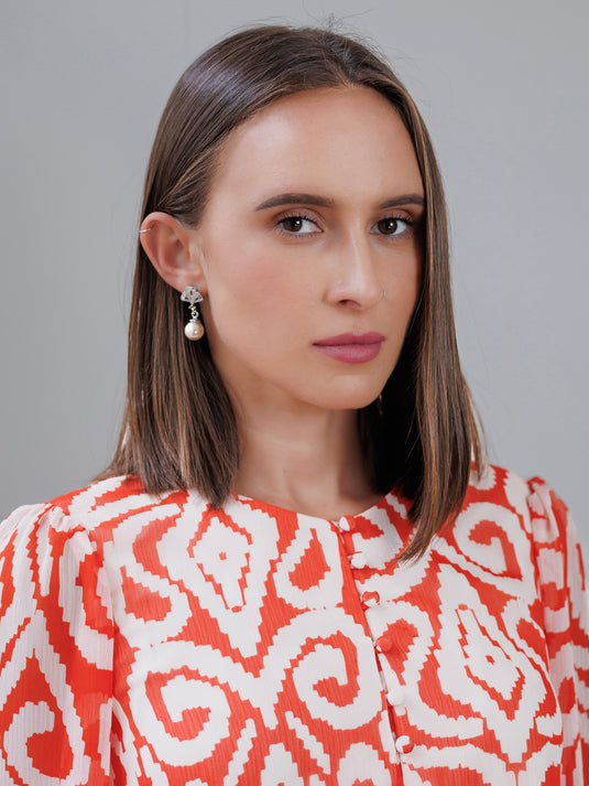 Printed blouse with smocked cuff