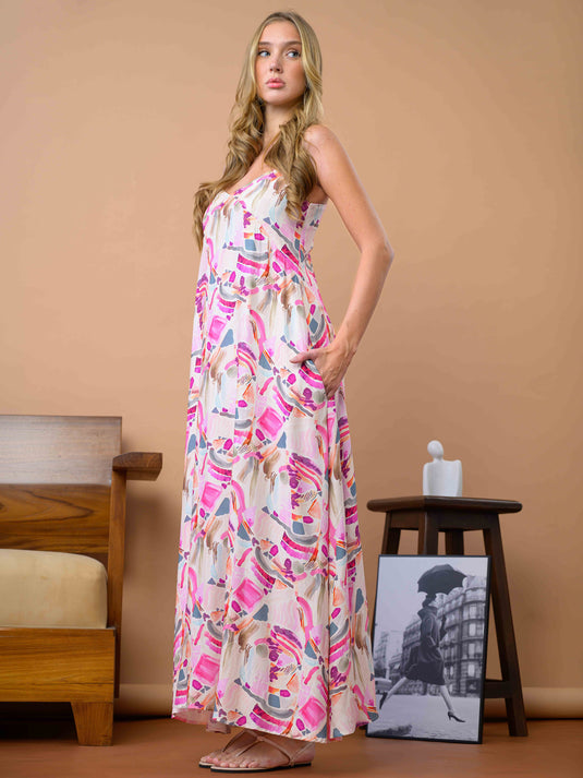 Printed sleeveless tiered dress with V neck