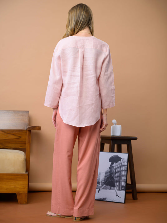 Oversized linen blouse with button detail