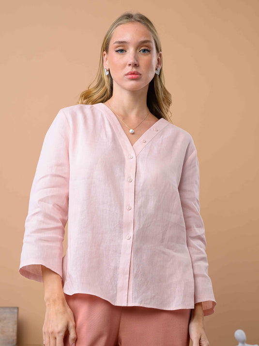 Oversized linen blouse with button detail