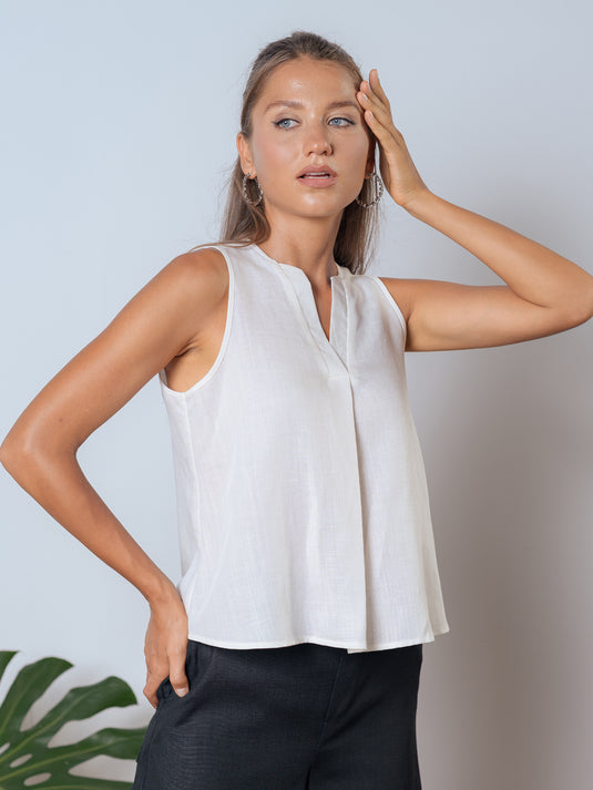 Sleeveless linen top with front pleat